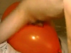 Big inflatable orange balloon humping cum