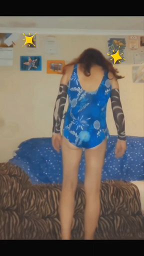 Posing in my gorgeous retro blue swimsuit in my white sandals and masturbating and coming onto my foot