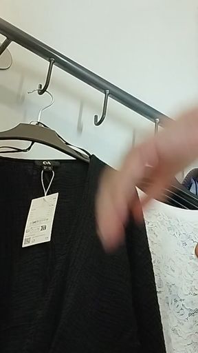 Sexy woman trying on clothes naked in the fitting room.   Clip 1