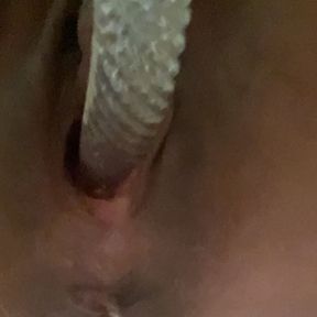 Using glass dildo in pussy close up