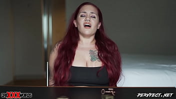 Santana's fiery redhead unleashes a torrent of cum as she comes hard