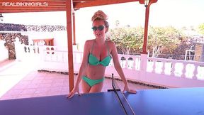 Three best girlfriend are playing table tennis without bikini tops