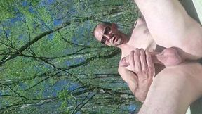 Naked in the middle of the forest