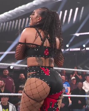 Black celebrity shows off her thick ebony ass in a wrestling match