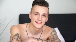 Two tattooed guys ennjoy their holes