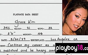Exotic asian beauty Grace Kim stripping during playing on a guitar