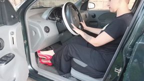 I pump and accelerate with desire and stiletto heels the pedals of the car(4)