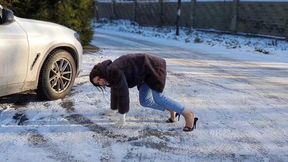 Girl on high heels on ice, mules on ice, high heels on ice, sandals on ice, slippery high heels