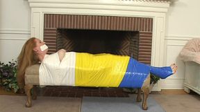 Three Different Colors Of Tape Secure Barefoot Jenna West To A Padded Bench!