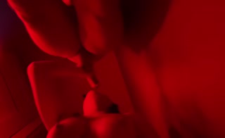 Titted brunette sucks in a nightclub