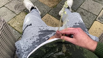 Having a nice warm piss on myself in the backyard