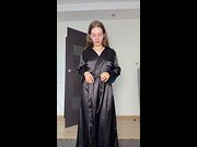 She slides the robe open slow and smiles at you 😳