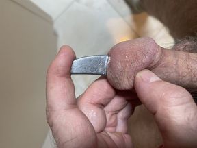 Sounding the widest part of the handle deeply.