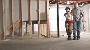 d2502SAHRYE-Curvy Latina left standing roped in her bra and girdle