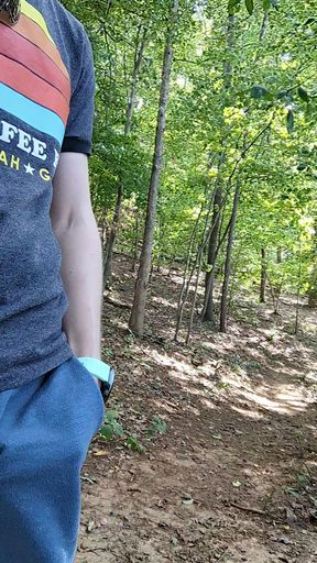 Rubbing myself through my shorts pocket while hiking until I have to stop and cum on the trail