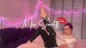 Scarlett's leather pants and white satin blouse tease