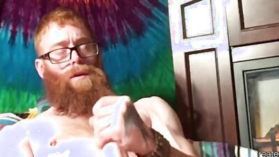 Ginger chap is jerking off in front of the phone