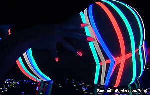 Colorful blacklight teasing with Samantha Saint
