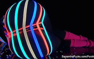 Colorful blacklight teasing with Samantha Saint