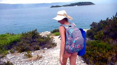 Russian-Croatian beauty Kateryna bares it all on a rocky Croatian shore
