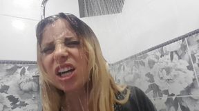 I'm wet in a latex bathing suit and I am taking a shower