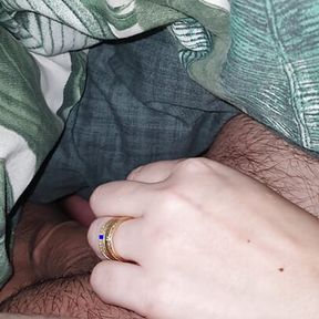 Step sister hand slip under blanket touching step brother dick and handjob him