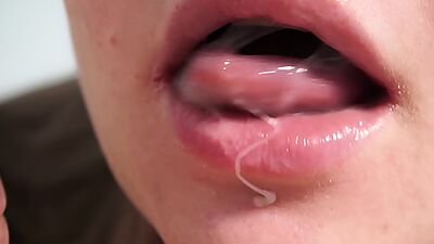 Close-up blowjob with cum in mouth and swallowing