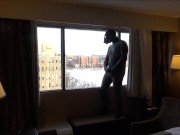 wetsuited masked horny guy comes onto hotel room window