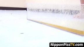Tasteful Japanese darlings shot peeing in closeup