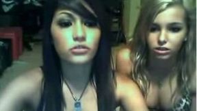 My friend and me dance in front of a webcam and show our boobs