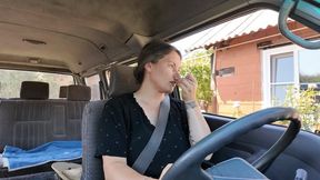while she is driving, she will clean her nose aV