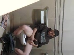 Guy caught masturbating in public bathroom