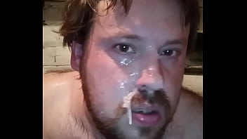 gay masturbates his big dick, cums, and then tastes his fresh cum and pours cum all over his face!