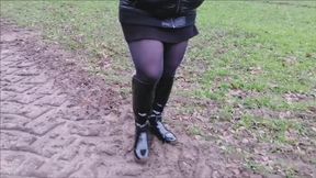 Boots, mud and miniskirt