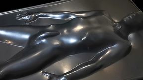 Sealed in the skintight black vacbed
