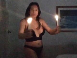 sexy transsexual doing her candle hot dance and tits out