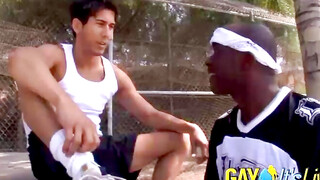 Black camboy tastes a white cock