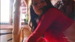 Brunette facing a black and white pair of cocks