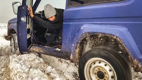 60_Russian Girl Stuck_Tanya got stuck in the snow in high-heeled boots on an SUV