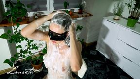 Lathering up my body and hair with shampoo