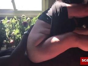 White homemade takes Big black cock in front of her window