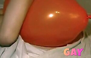 Twink Humping and Cumming on an Inflatable Orange Balloon