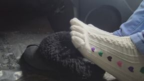 Slippers and toe socks tease in car