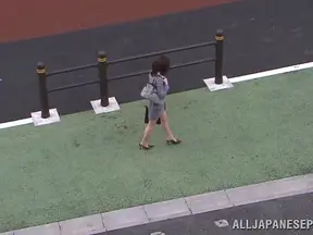 Kinky Japanese mature Kyoko Nakajima enjoys anal insertions outdoors