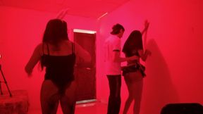 The birthday boy receives a sexual fantasy dance. Two women turn him on dancing.