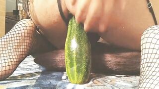 Watch this sissy crossdress as he pounds his Pink Hole with a massive cucumber
