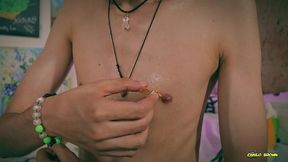 playing with my nipples, oil and clamps.