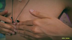 playing with my nipples, oil and clamps.