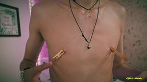 playing with my nipples, oil and clamps.