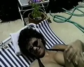 Hottest French babe shows off perfect tits while swimming poolside